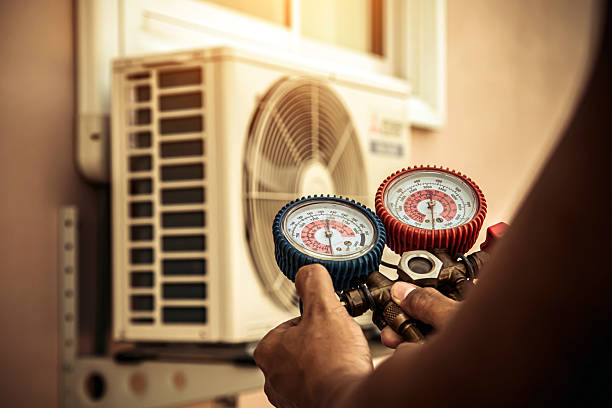 Professional Hvac technician working in Greensboro, MD